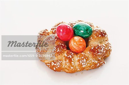 Bread wreath with pearl sugar and Easter eggs