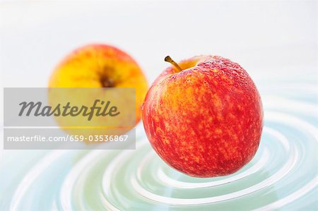 Two Royal Gala apples