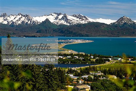 Scenic view overlooking the town of Homer, the Homer Spit, Kachemak Bay and the Kenai Mountains during Summer in Southcentral Alaska