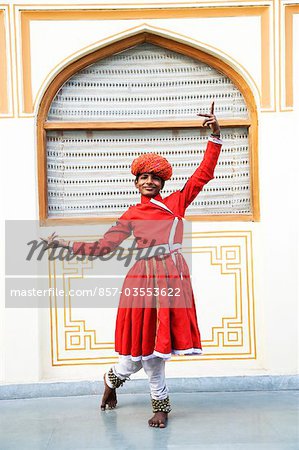 Folk dancer performing in a palace, City Palace, Jaipur, Rajasthan, India