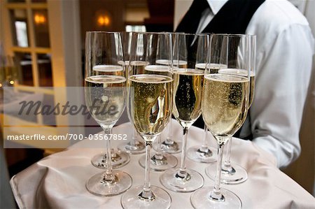 Waiter Holding Tray of Champagne