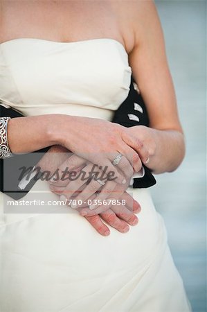 Close-up of Bride and Groom Hugging