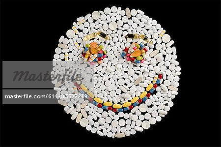 Happy face made from pills