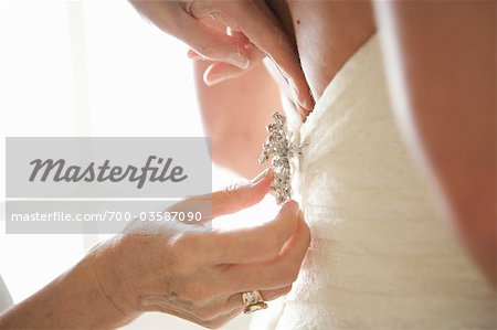 Afixing Brooch to Back of Wedding Gown