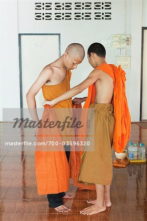 Dress New Monk Initiate at Wat Luang, Ubon Ratchathani, Thailand