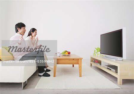 Japanese Couple Watching TV