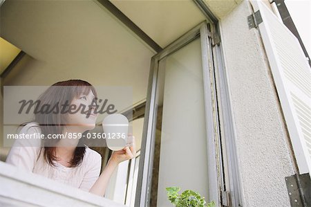 Japanese Woman Looking Outside