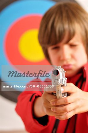 Boy Aiming Gun