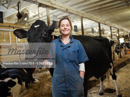 Portrait of Farmer with Cow, Ontario, Canada