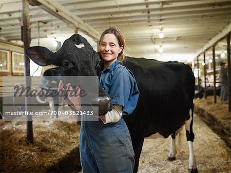 Portrait of Farmer with Cow, Ontario, Canada