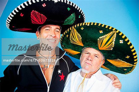 portrait of two men wearing sombreros