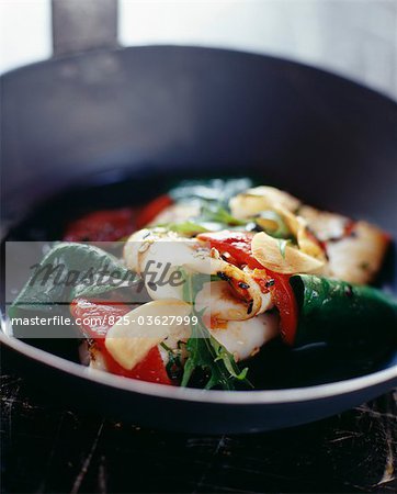 Pan-fried squid with spinach and peppers