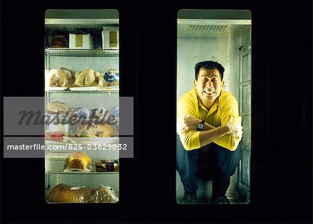 Freezing man in a refrigerator