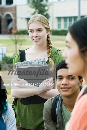 High school student chatting with friends