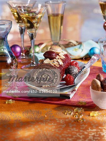 Chocolate,cherry,almond and nougatine rolled log cake Chocolate,cherry,almond and nougatine rolled log cake