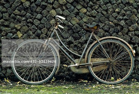 Bicycle In Front Of Turf Pile