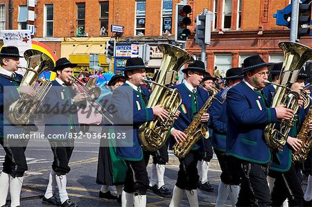 Dublin, Ireland; Musicians Play Tubas In A Parade On O'connell Street