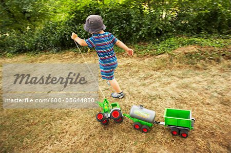 Boy Playing Outdoors, Domaine de l'Ardagnole, Fajac-en-Val, Aude, Languedoc-Roussillon, France