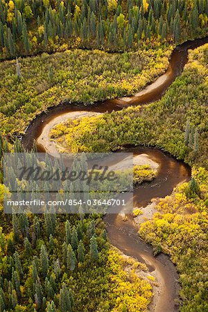 Aerial view of the Talachulitna River winding its way through lowlands below the Tordrillo Mountains, Southcentral Alaska, Fall