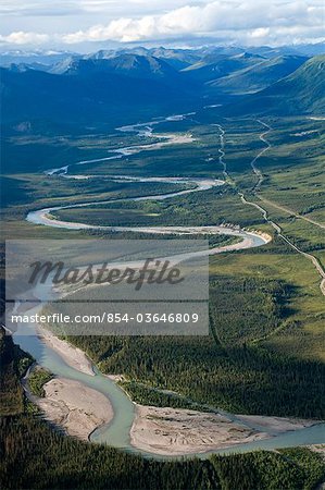 Aerial view of the Middle Fork of the Koyukuk River running parallel to the Trans Alaska Pipeline and Dalton Highway near the eastern edge of Gates of the Arctic National Park & Preserve, Arctic Alaska, Fall