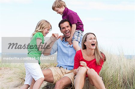 Family having fun at the coast