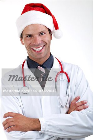 Doctor with stethoscope and Santa's hat