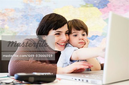 woman with boy in office