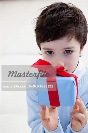 little boy with present