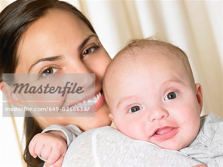 Mother with her baby-boy, smiling