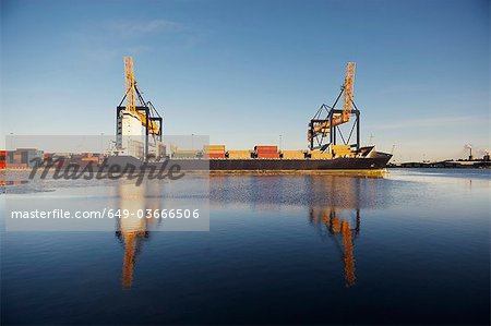 Containers on ship in container port
