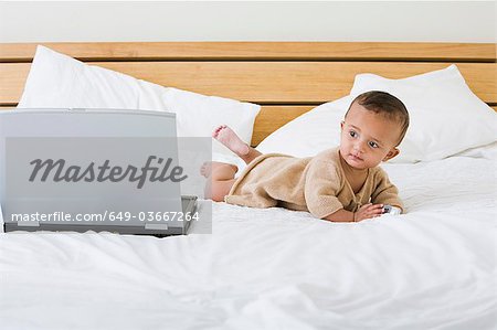 baby on bed