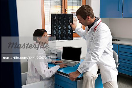 Doctors looking at a MRI of ankle