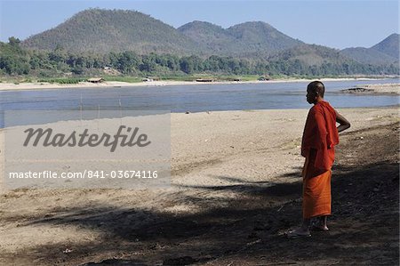 Monk at the Mekong River, Luang Prabang, Laos, Indochina, Southeast Asia, Asia
