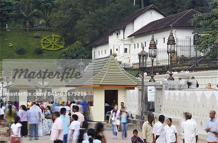 People outside Temple of the Tooth (Sri Dalada Maligawa), UNESCO World Heritage Site, Kandy, Sri Lanka, Asia