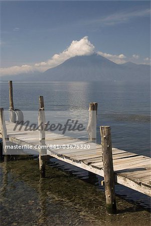 A jetty in Panajachel, San Pedro Volcano in the background, Lake Atitlan, Guatemala, Central America