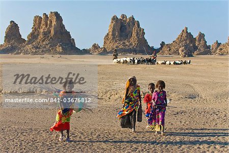 Local Afar children with their sheep, Lac Abbe (Lake Abhe Bad) with its chimneys, Republic of Djibouti, Africa