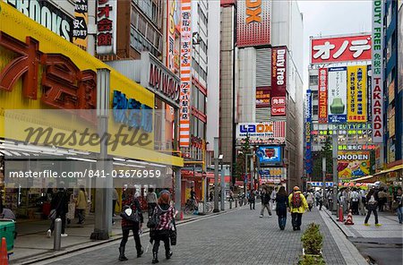 Neon signs cover buildings in the world famous consumer electronics district of Akihabara, Tokyo, Japan, Asia