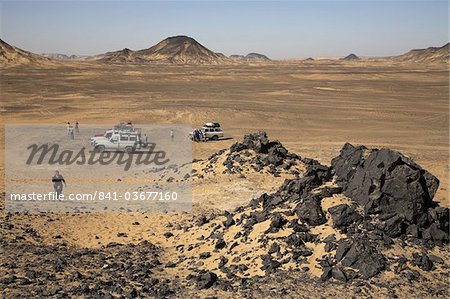 Tourist jeeps in the Black Desert, 50 km south of Bawiti, Egypt, North Africa, Africa