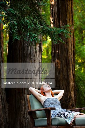 Woman Relaxing on Deck, Santa Cruz County, California, USA