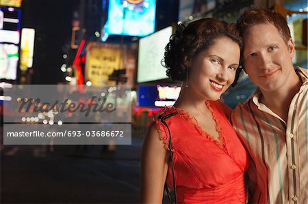 Young Couple in City at Night, close up