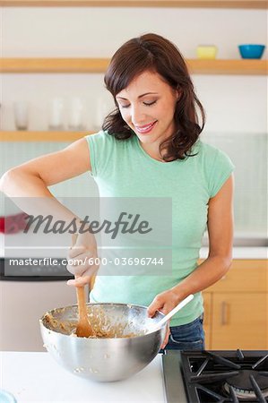 Woman Mixing Cookie Dough, Portland, Oregon, USA