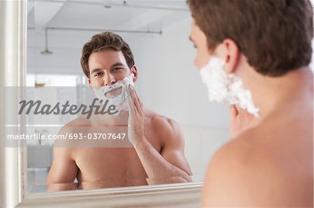Barechested Man Shaving