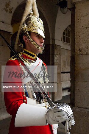 England, London, Horseguards. A Guardsman in the Household Cavalry holding a Ceremonial Sword.