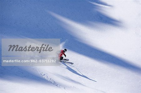 A skier on the Grands Montets,Chamonix,France.