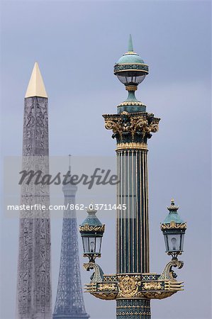 The Obelisk of Luxor, the Eiffel Tower and a lamp post in the Jardin des Tuileries in Paris