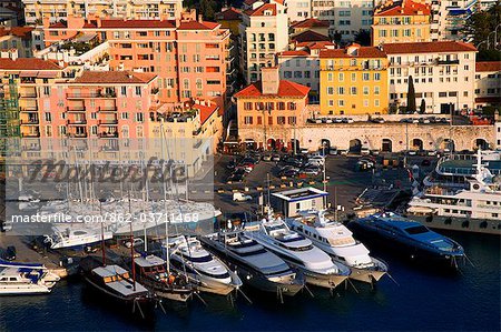 France, Cote D'Azur, Nice; Yachts in the Bassin du Commerce seen from the Parc du Chateau.