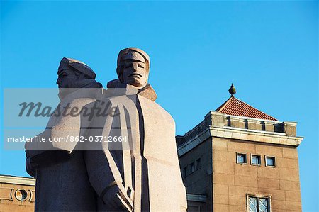 Statue of Latvian Red Riflemen in Town Hall square (Ratslaukums), Riga, Latvia