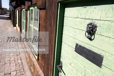 Sweden, Island of Gotland, Visby. The residential streets are made up of single story timber build cottages.