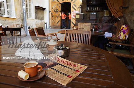 Woman sitting in Dyzga Cafe, Lviv, Ukraine