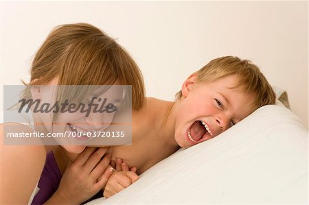 Brother and Sister Laughing